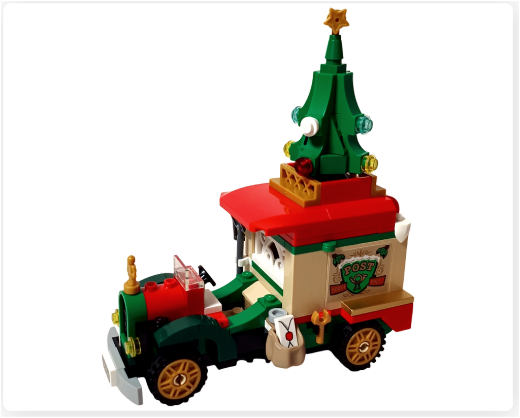 レゴ 40746 シーズナル クリスマスプレゼント配達トラックの屋根に、完成したミニクリスマスツリーを載せた写真。ツリーは回転ギミックで向きを変えられ、屋根上の赤い台座にしっかり固定されています。