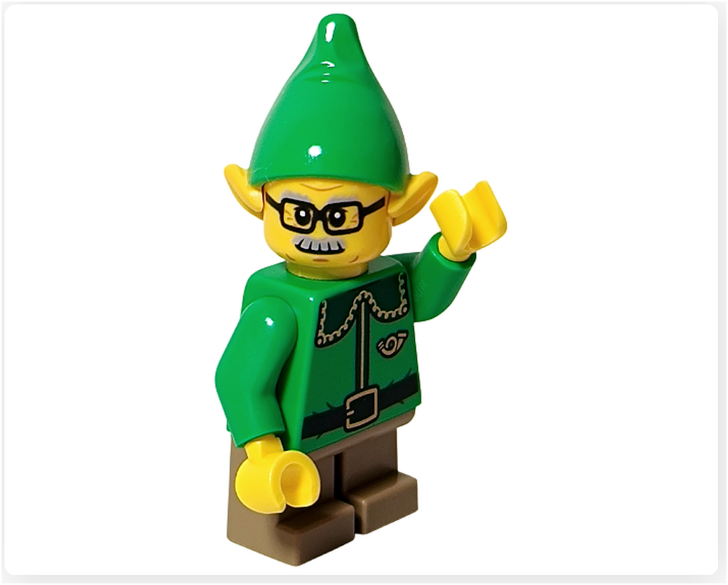 レゴ 40746 シーズナル クリスマスプレゼント配達トラックのエルフが手を上げている様子を撮影した写真。緑の帽子と制服を着たミニフィグが、挨拶をするような軽いポーズをとっている構図です。