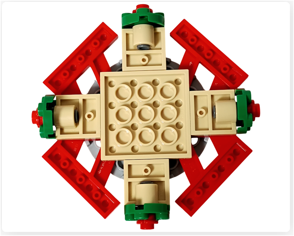 レゴ 40778 雪のあずまや(Winter Gazebo)の天井裏側。ベージュの中心プレートを軸に、赤いフレームと内部構造が十字状に組まれている様子。