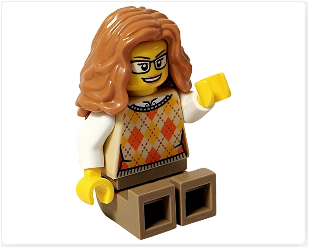 レゴ 40778 雪のあずまや（Winter Gazebo）に含まれるコントラバス奏者ミニフィグの座りポーズ。眼鏡をかけた笑顔と、アーガイル柄ベスト、ブラウンのパンツを履いた姿で、片手を軽く上げて座っている様子が分かる。