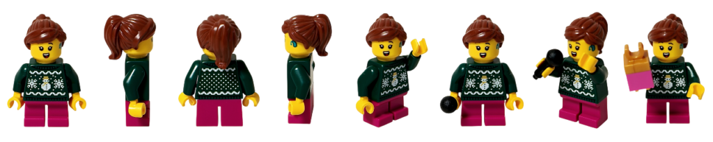 レゴ 40778 雪のあずまや（Winter Gazebo）に含まれるキャロル合唱団の歌い手（女の子）ミニフィグのサムネイル。正面・側面・背面の各角度と、片手を上げたポーズ、マイクを持って歌う姿、プレゼントを持つポーズを並べ、深緑のセーターに雪だるま柄、ピンクのパンツ、ポニーテールの髪型とイヤーピース風のプリントが確認できる。