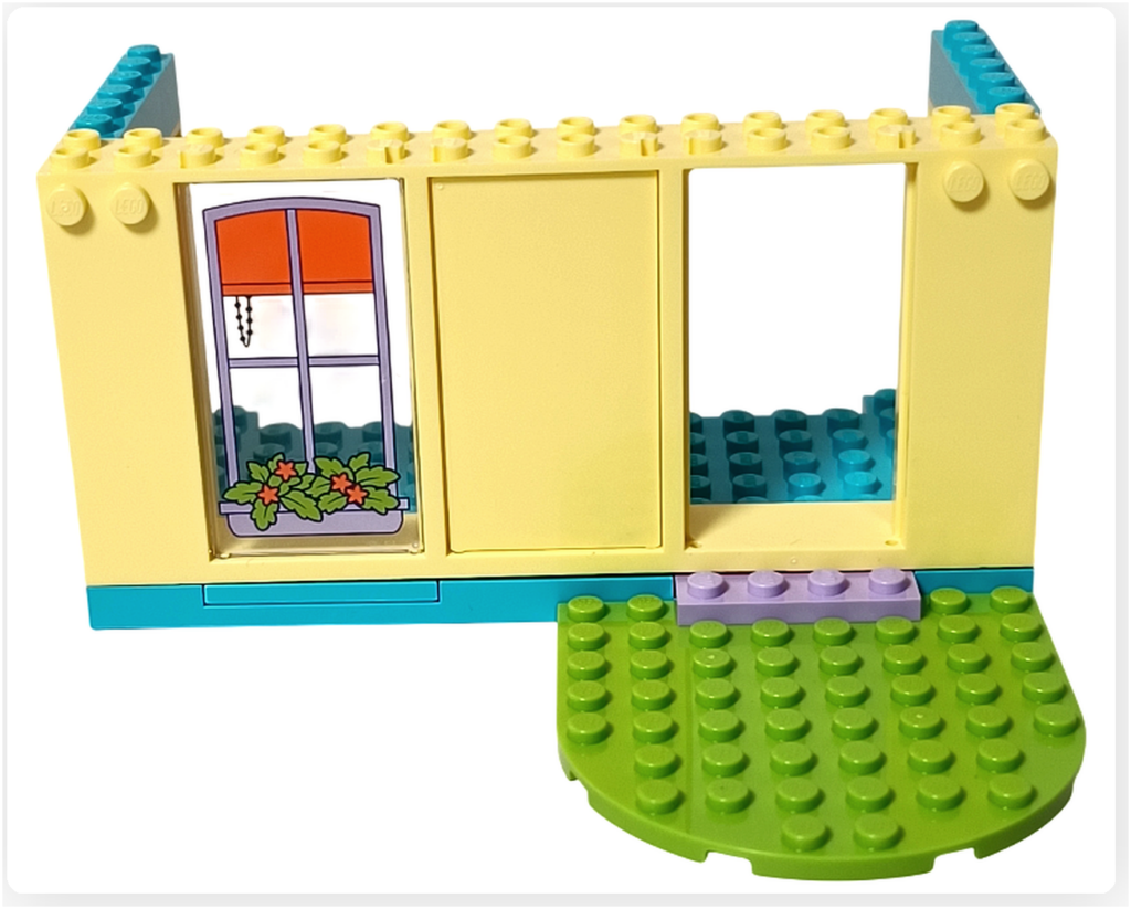 レゴ フレンズ 41724「ペイズリーのおうち」一階正面の壁。窓パーツと開口部を備えた黄色の外壁構成。