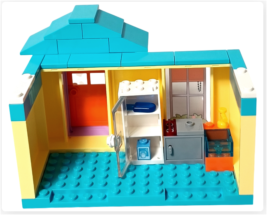 レゴ フレンズ 41724「ペイズリーのおうち」一階キッチンの冷蔵庫。開いた扉と内部の飲み物パーツが確認できる。