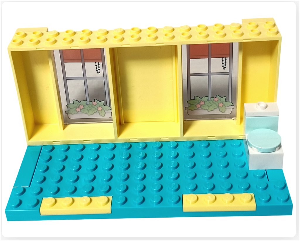 レゴ フレンズ 41724「ペイズリーのおうち」2階トイレの組立。白と水色のトイレパーツが設置された小さな個室空間。