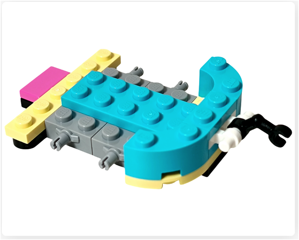 レゴ フレンズ 41733「タピオカティ スタンド」の屋台床の組立途中。曲面パーツが取り付けられ、カウンター側の輪郭が見えている。