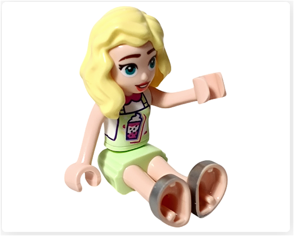 レゴ フレンズ 41733「タピオカティ スタンド」マチルダが床に座り、脚を前に伸ばし右腕を上げている状態