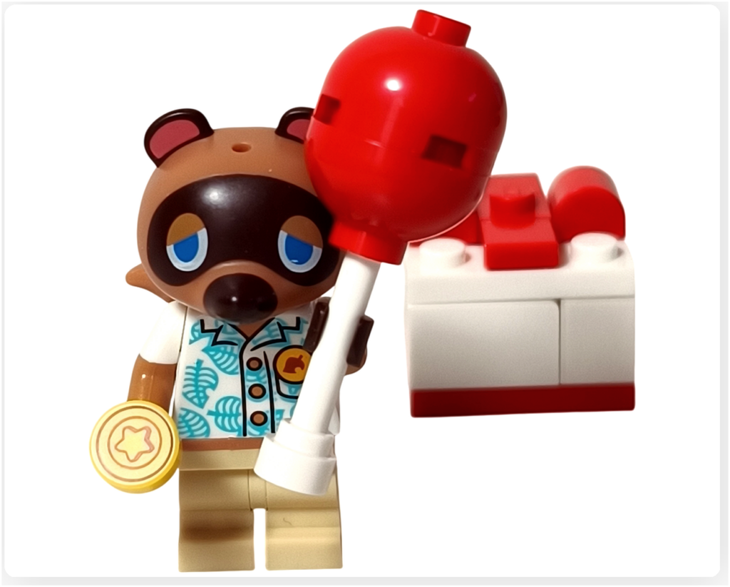 レゴ どうぶつの森 30731 たぬきちと空飛ぶプレゼント たぬきち ベルを持って満足しているシーン