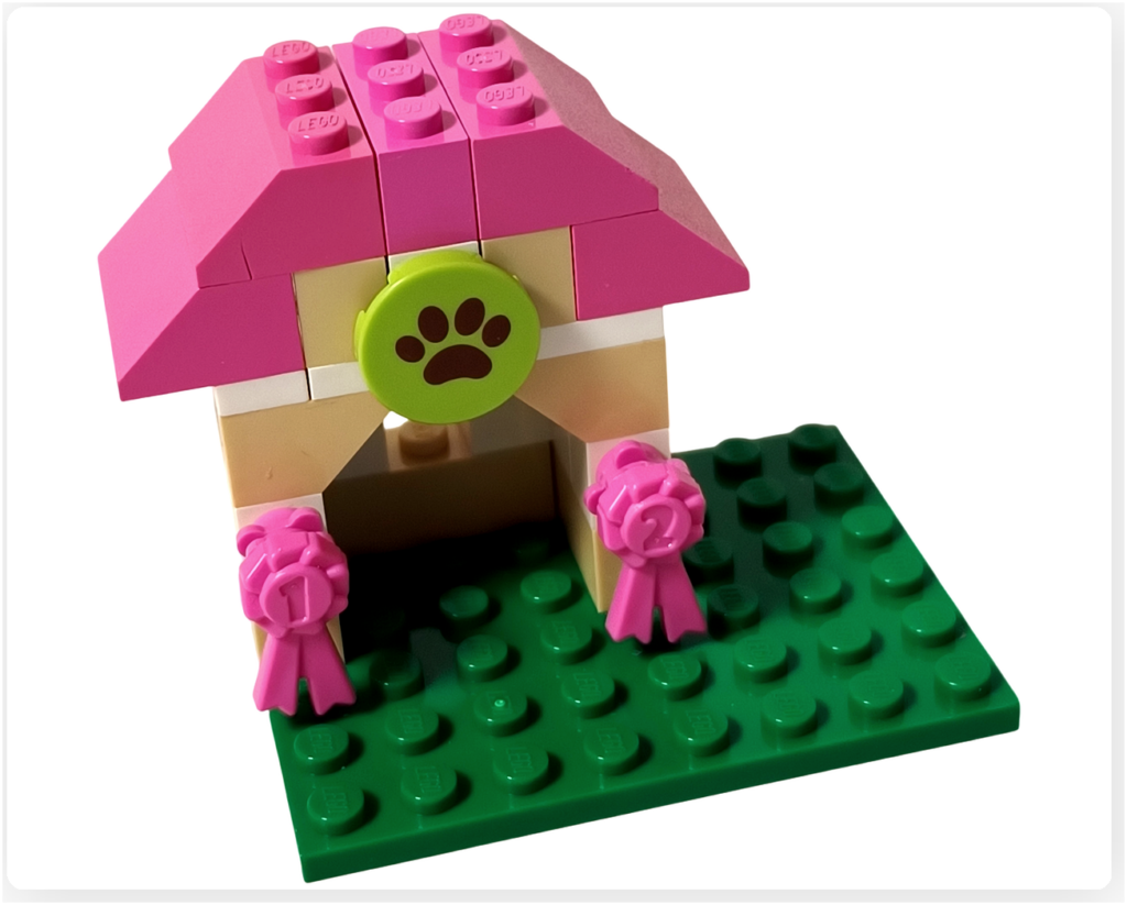 レゴ 3934 パピーハウス パピーハウスの完成した犬小屋。肉球マークと表彰リボンが飾られた犬小屋