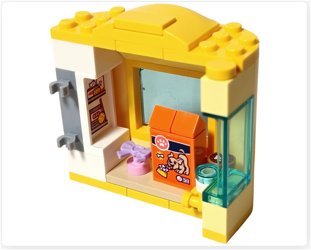 ワンちゃんレスキュートラック ドッグフードとアクセサリーを並べたケアスペース