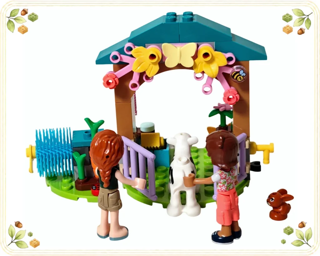 レゴ 42607 オータムの仔牛小屋の開いた柵から小屋へ入る仔牛と見守るオータム、レオ、子ウサギ