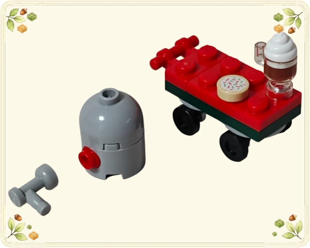 レゴ 60510 アドベントカレンダー2026 カップとクッキーを載せた赤と緑のカート、その横に外した灰色の容器と注ぎ口