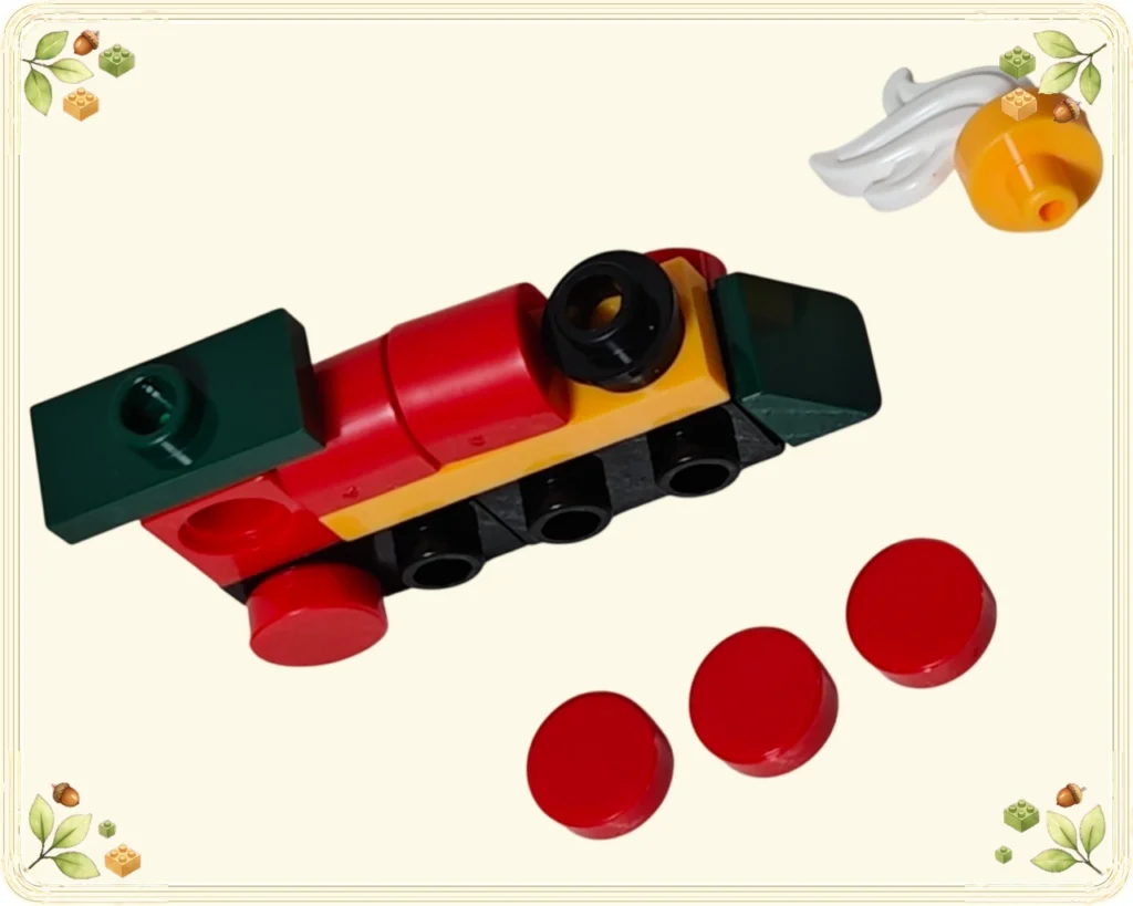 レゴ 60510 アドベントカレンダー2026 赤い胴体と深緑の屋根を付けた機関車、側面から外した赤い丸いパーツ、白い煙付きの煙突上部